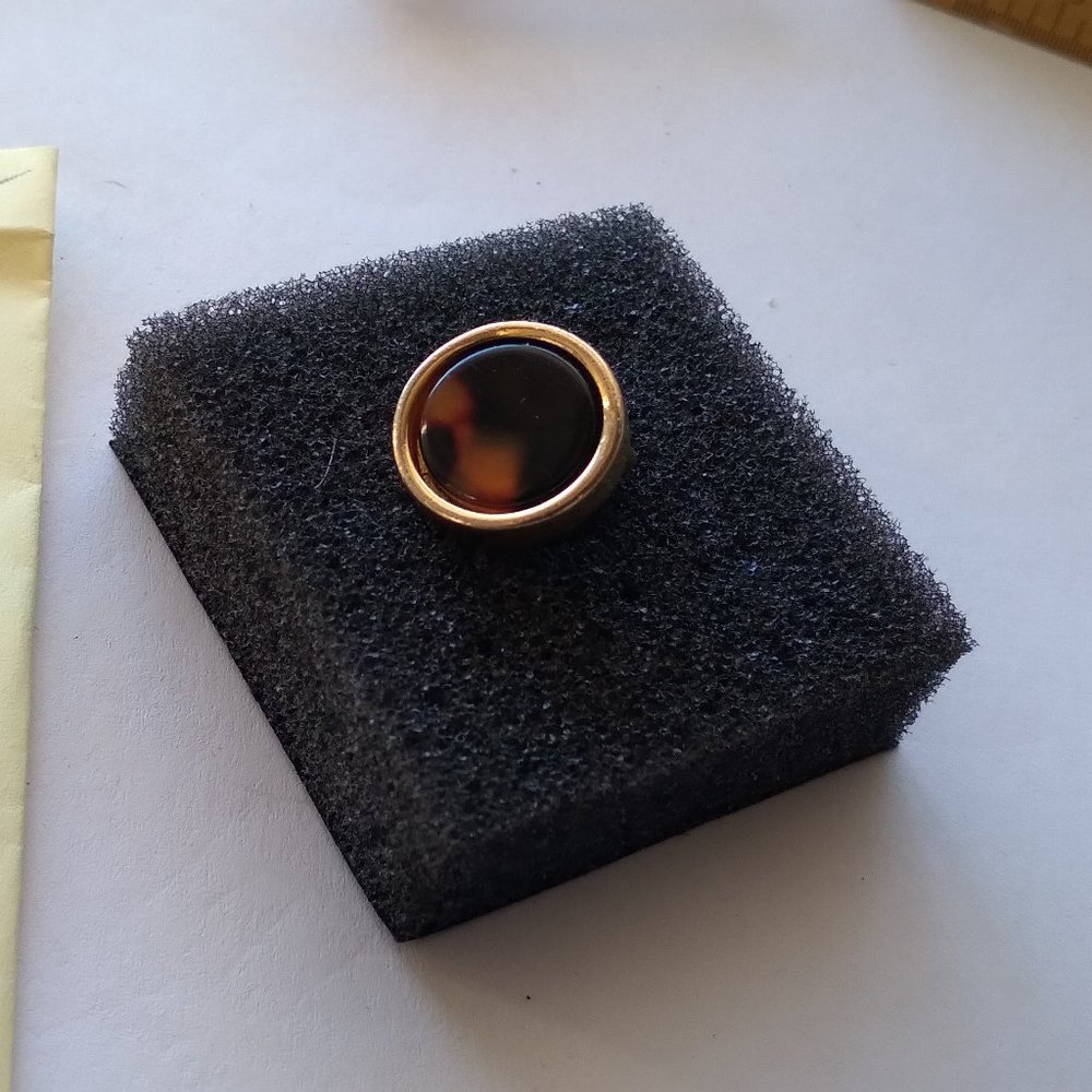 9 West men's tie clip with tiger-eye stone